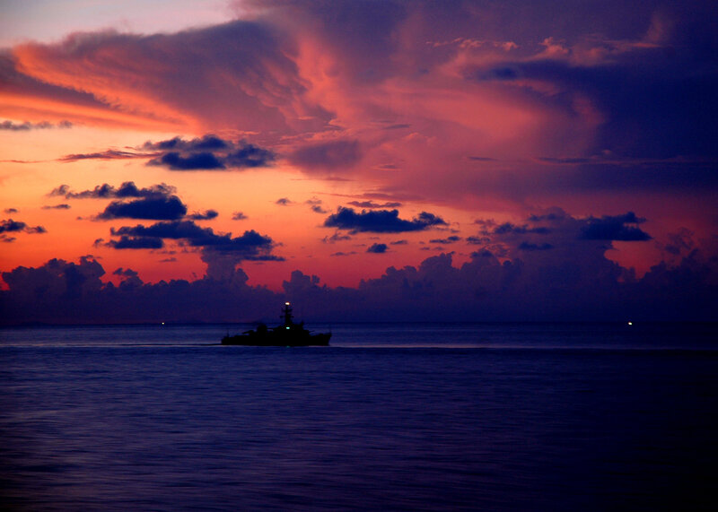 Sunset with ship silhouette