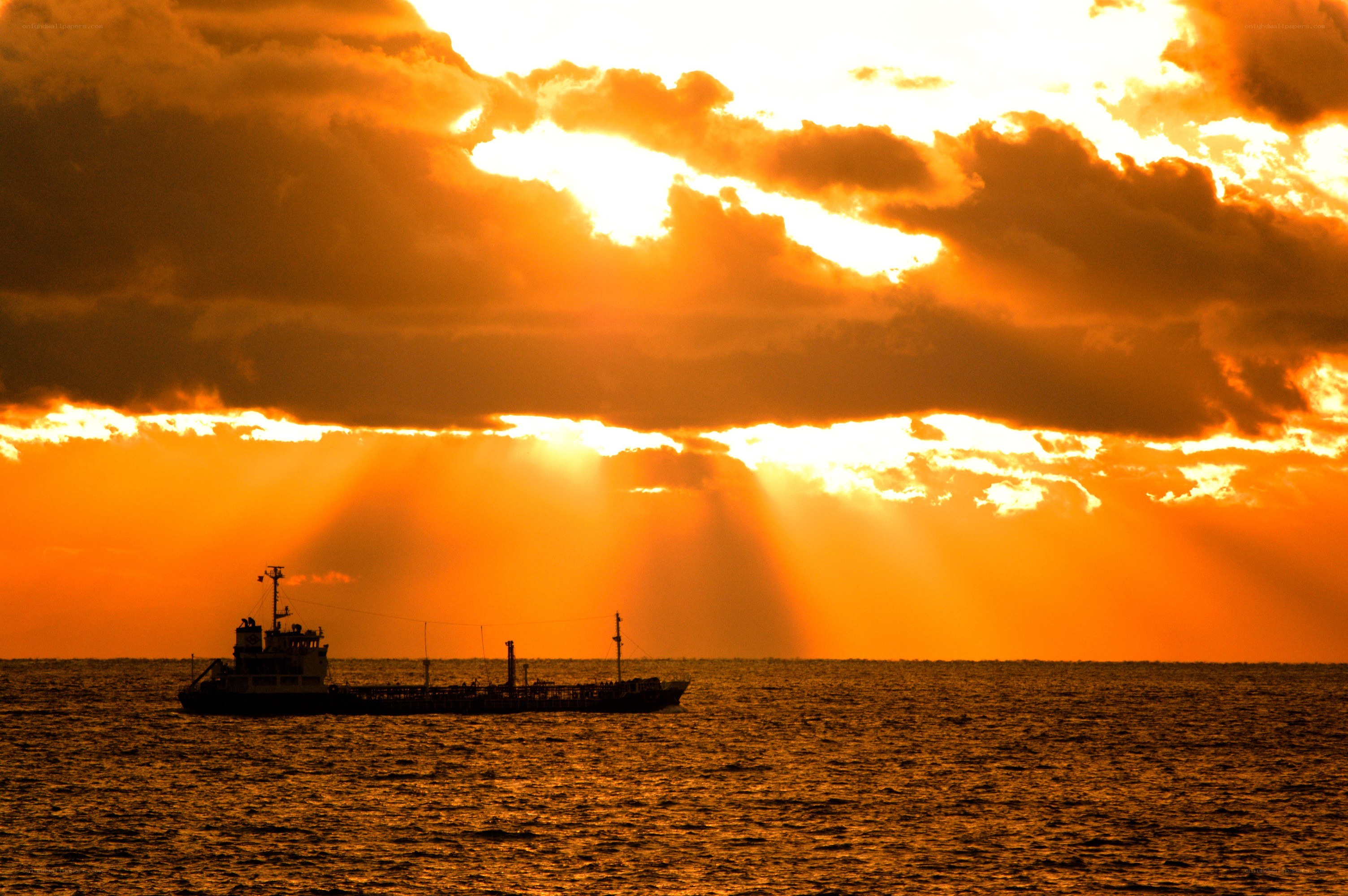 Sunset with ship silhouette