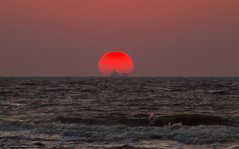 Sunset with ship silhouette