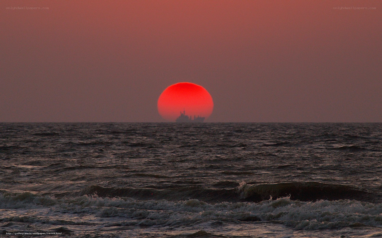 Sunset with ship silhouette