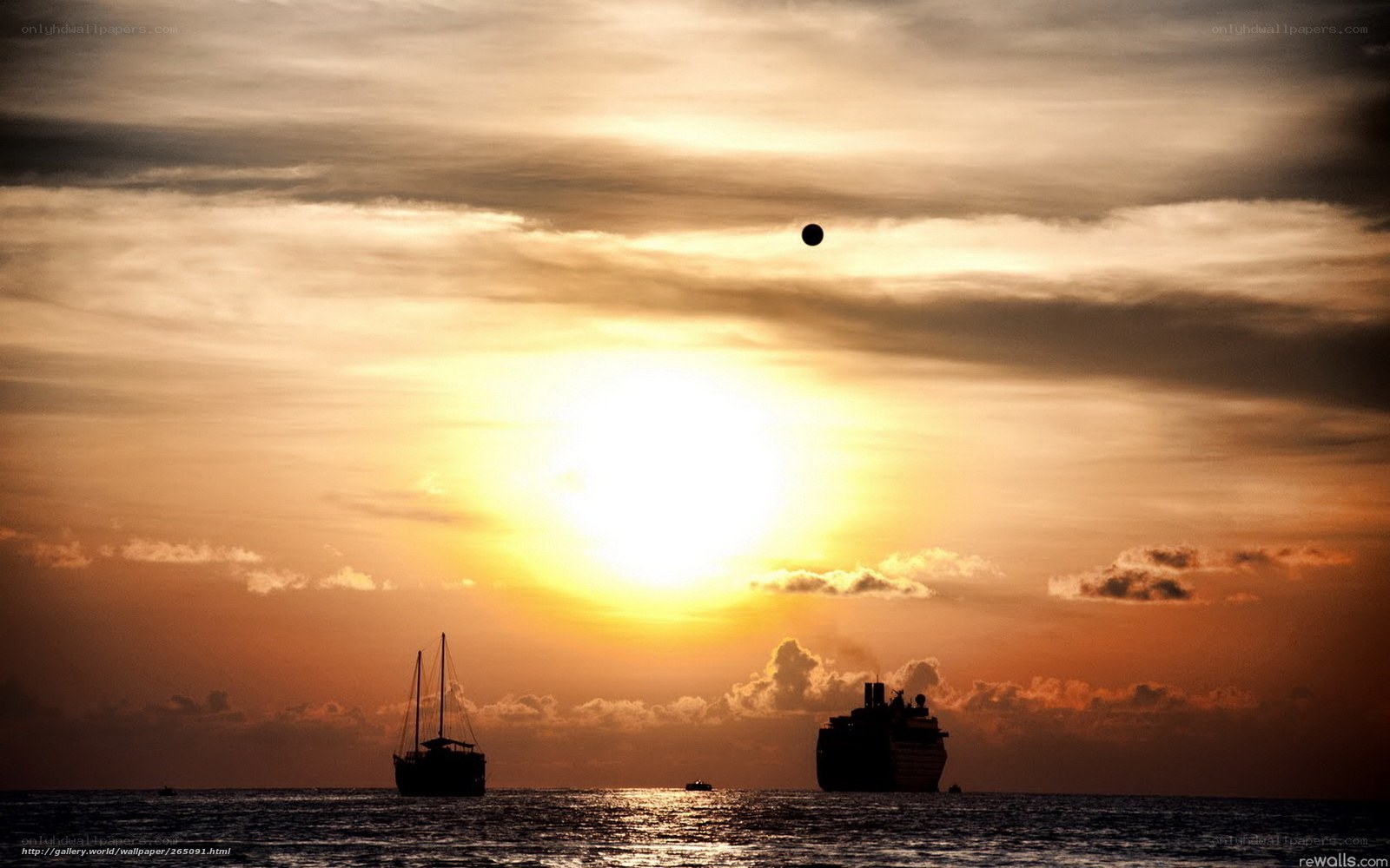 Sunset with ships silhouette