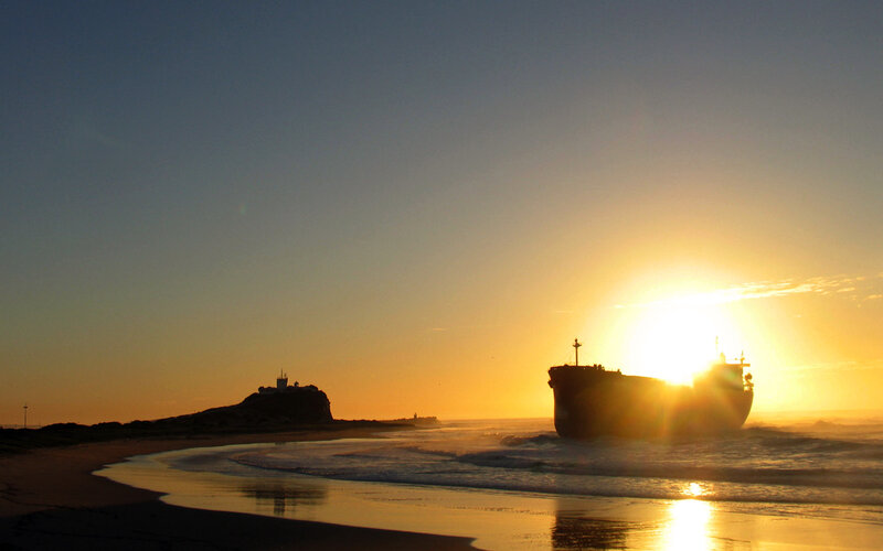 Sunset with shipwreck silhouette