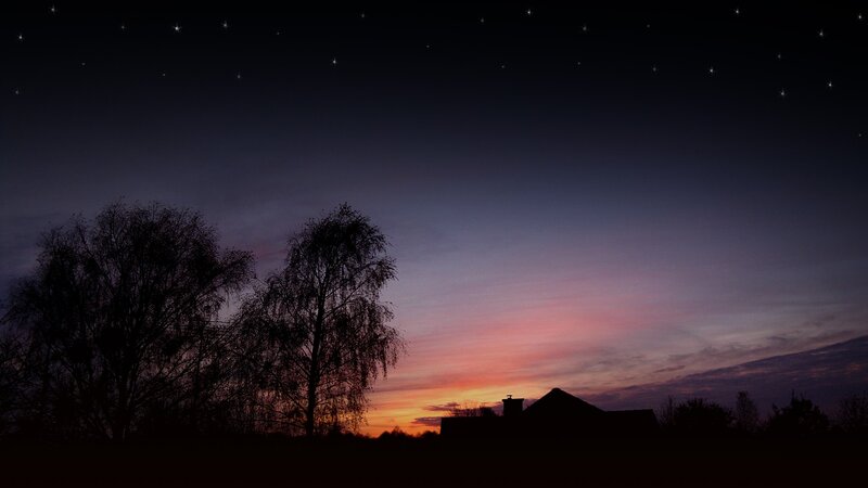sunset with stars and silhouettes