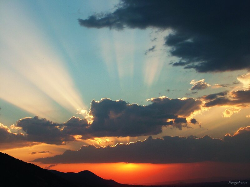 Sunset with sunbeams