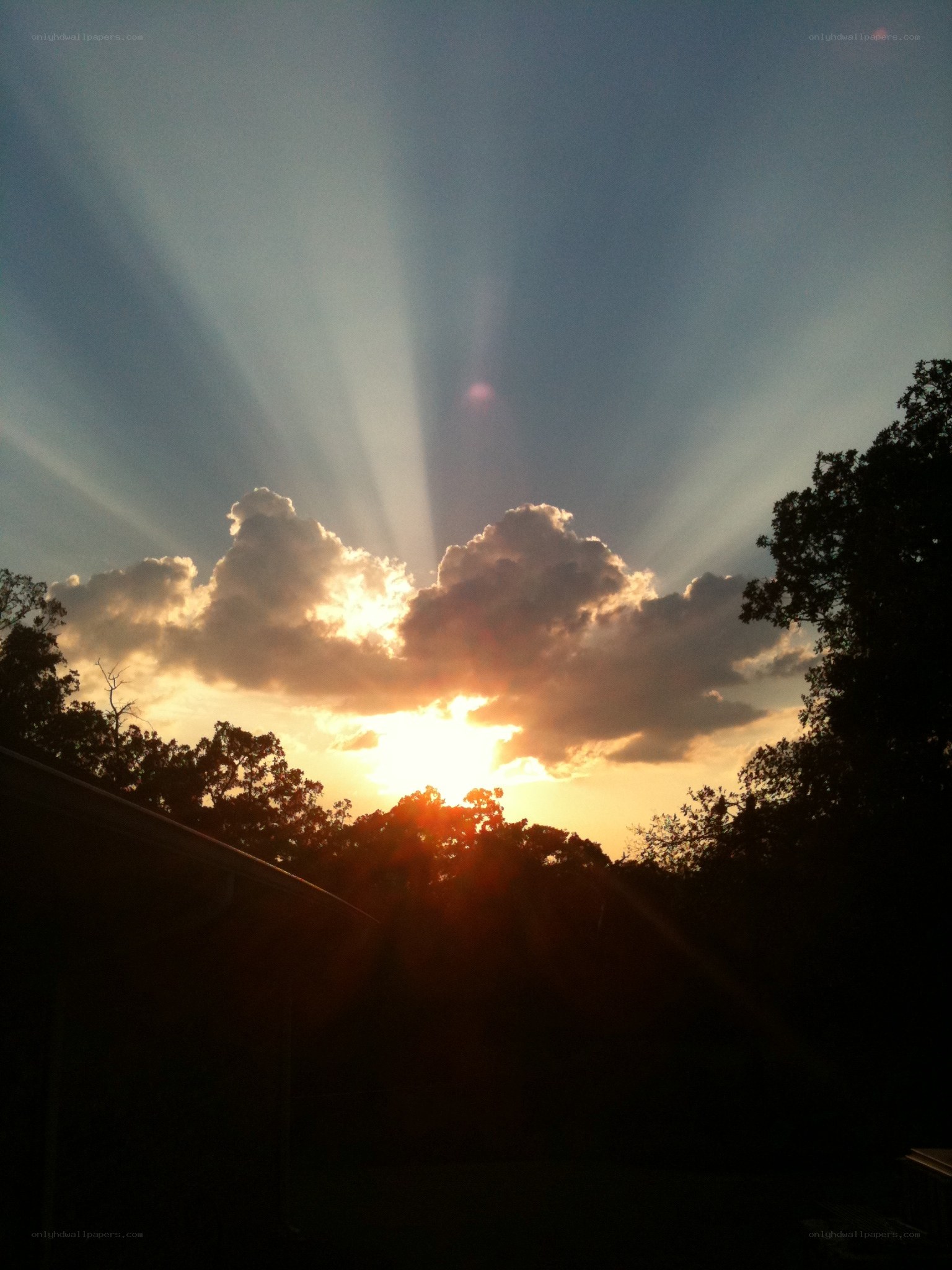 Sunset with sunbeams
