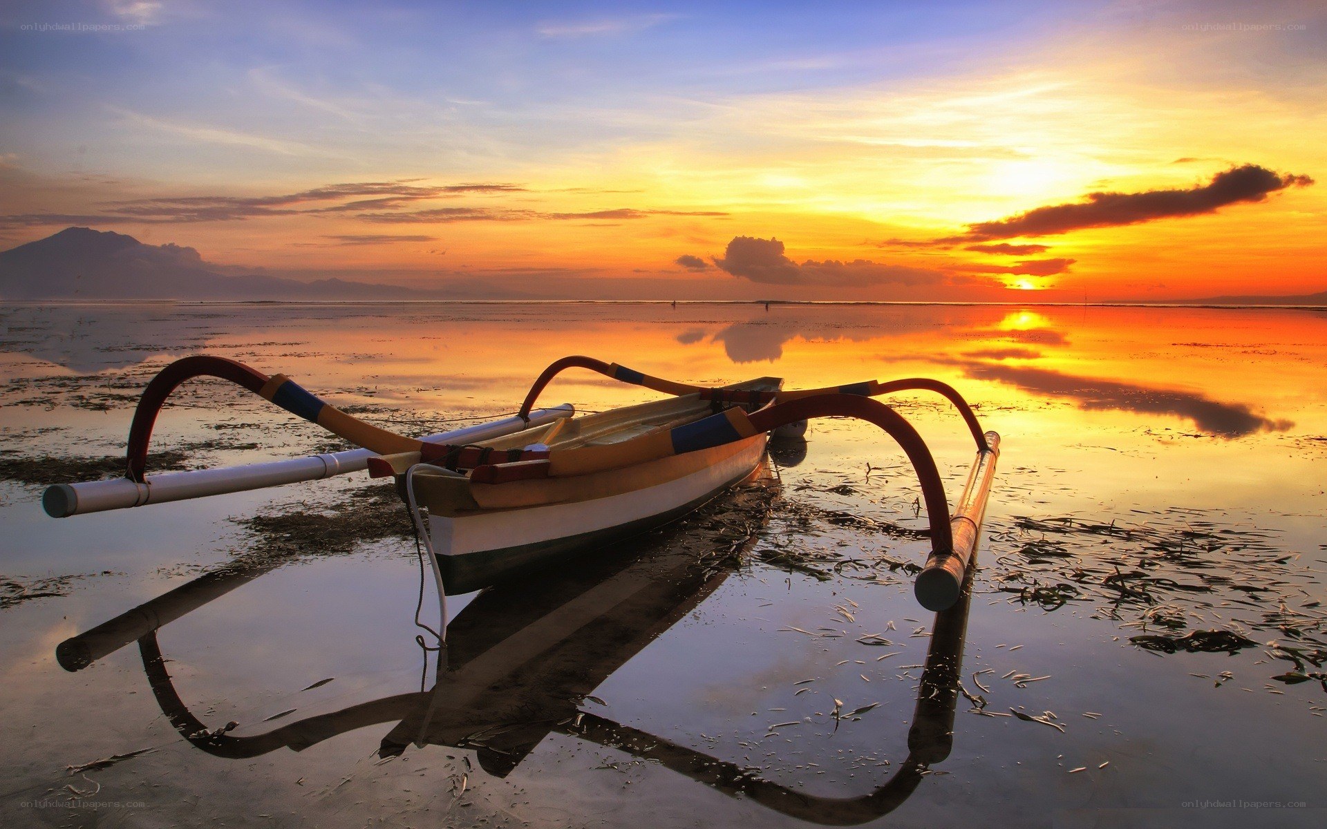 Sunset with traditional boat