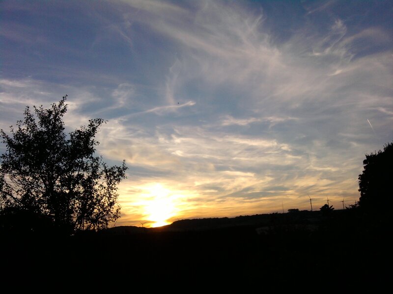 sunset with wind turbines