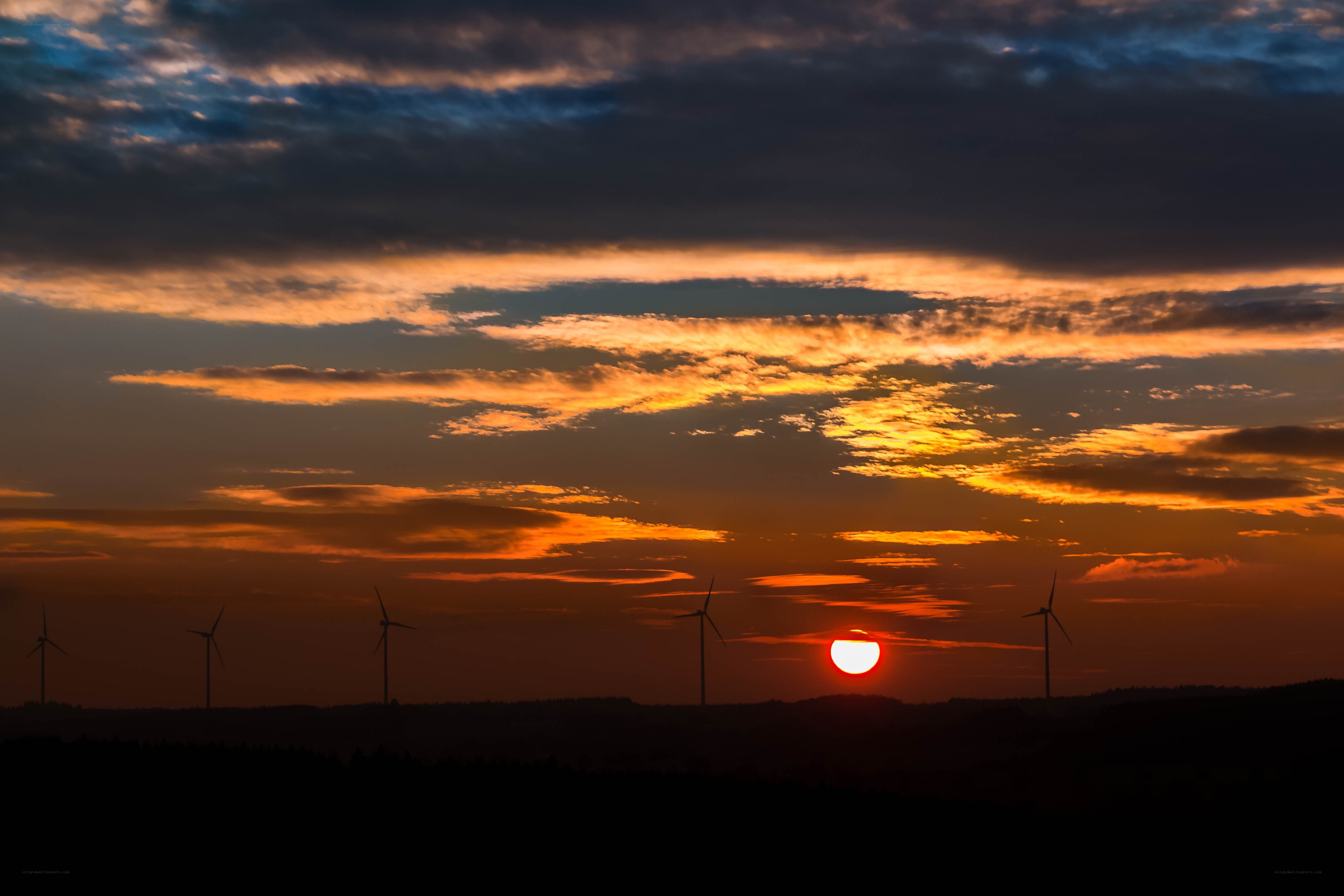 Sunset with wind turbines