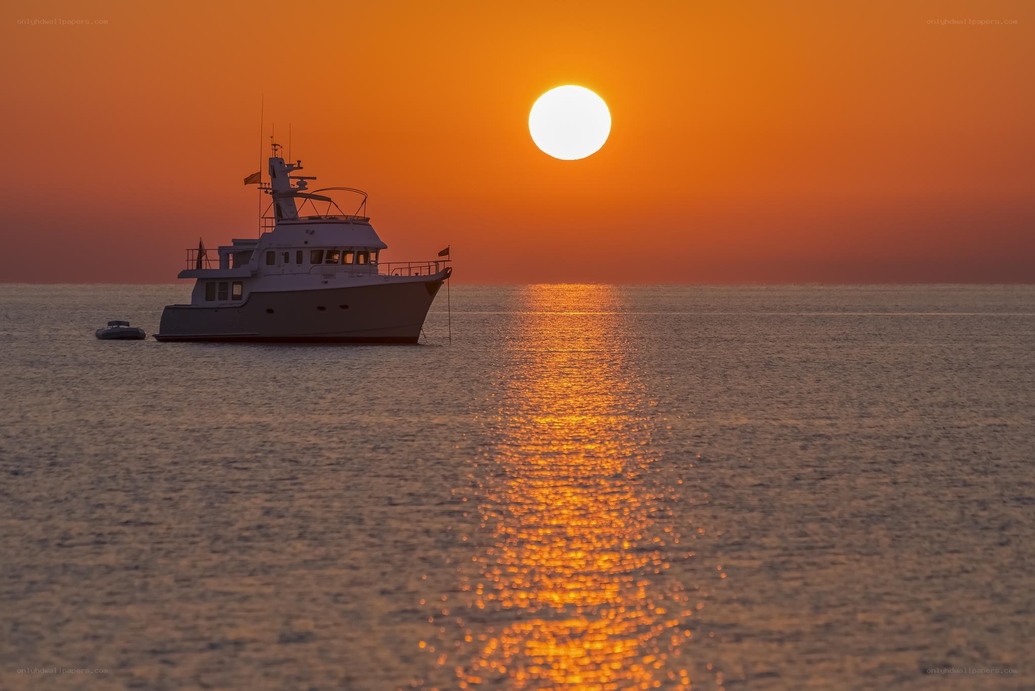 Sunset with yacht at sea