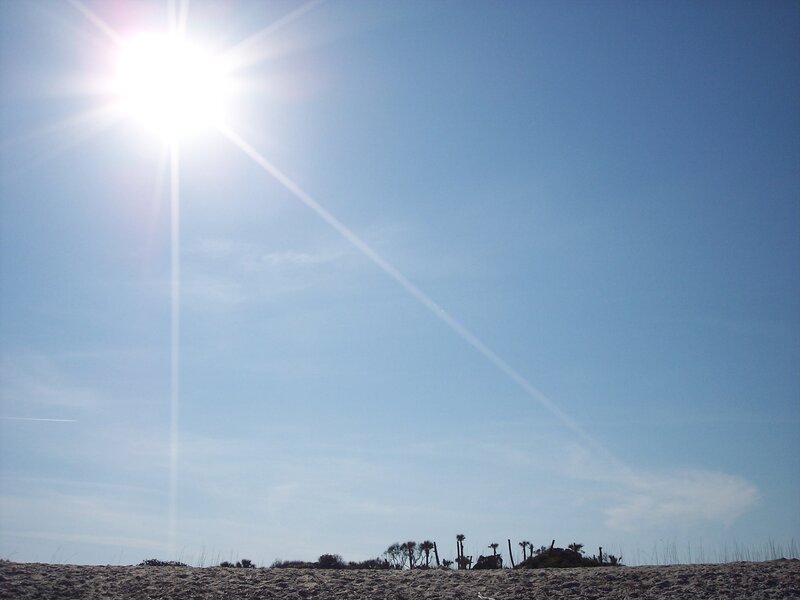 Sunshine over sandy dunes