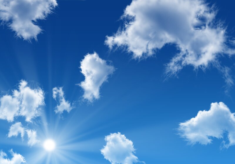 Sunshine with fluffy clouds
