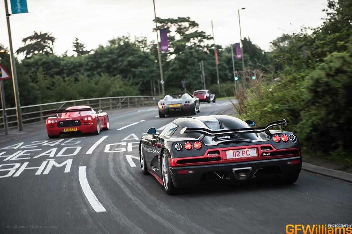 Supercar convoy on a road