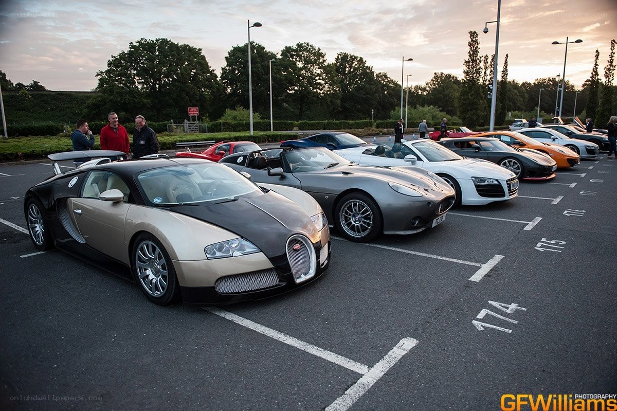 Supercar gathering at sunset