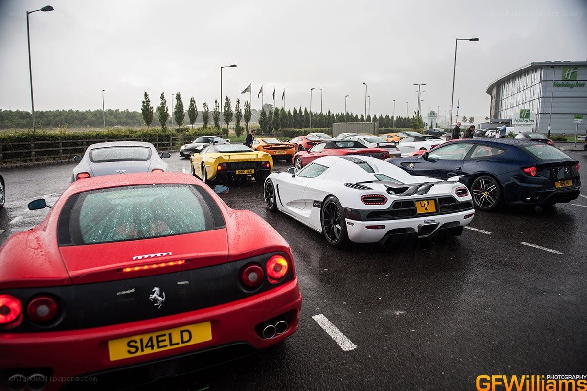 supercar gathering in rain