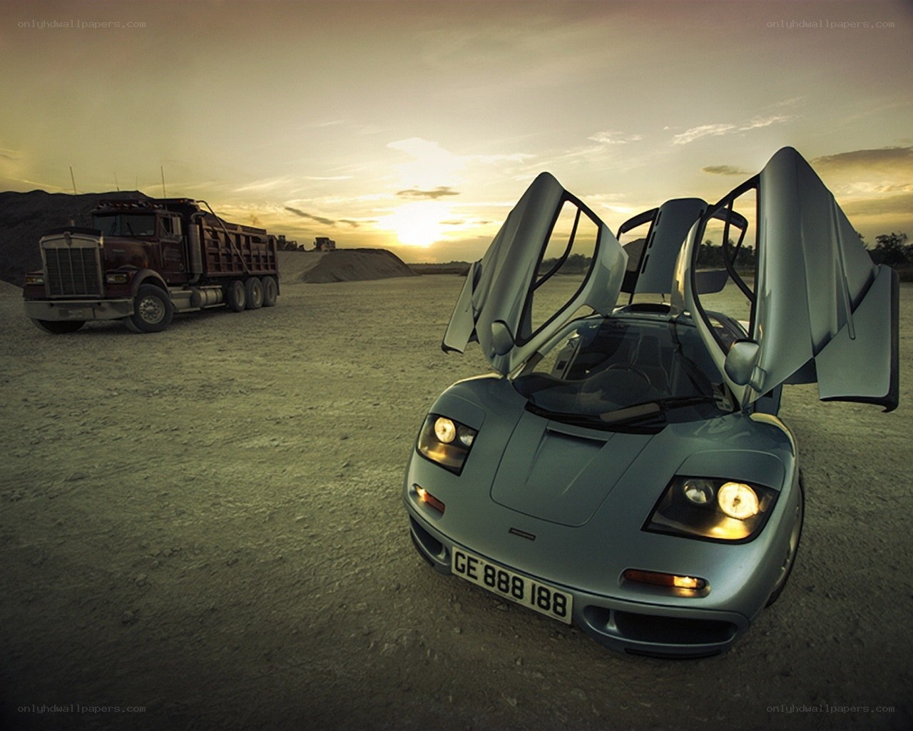 Supercar in desert at sunset