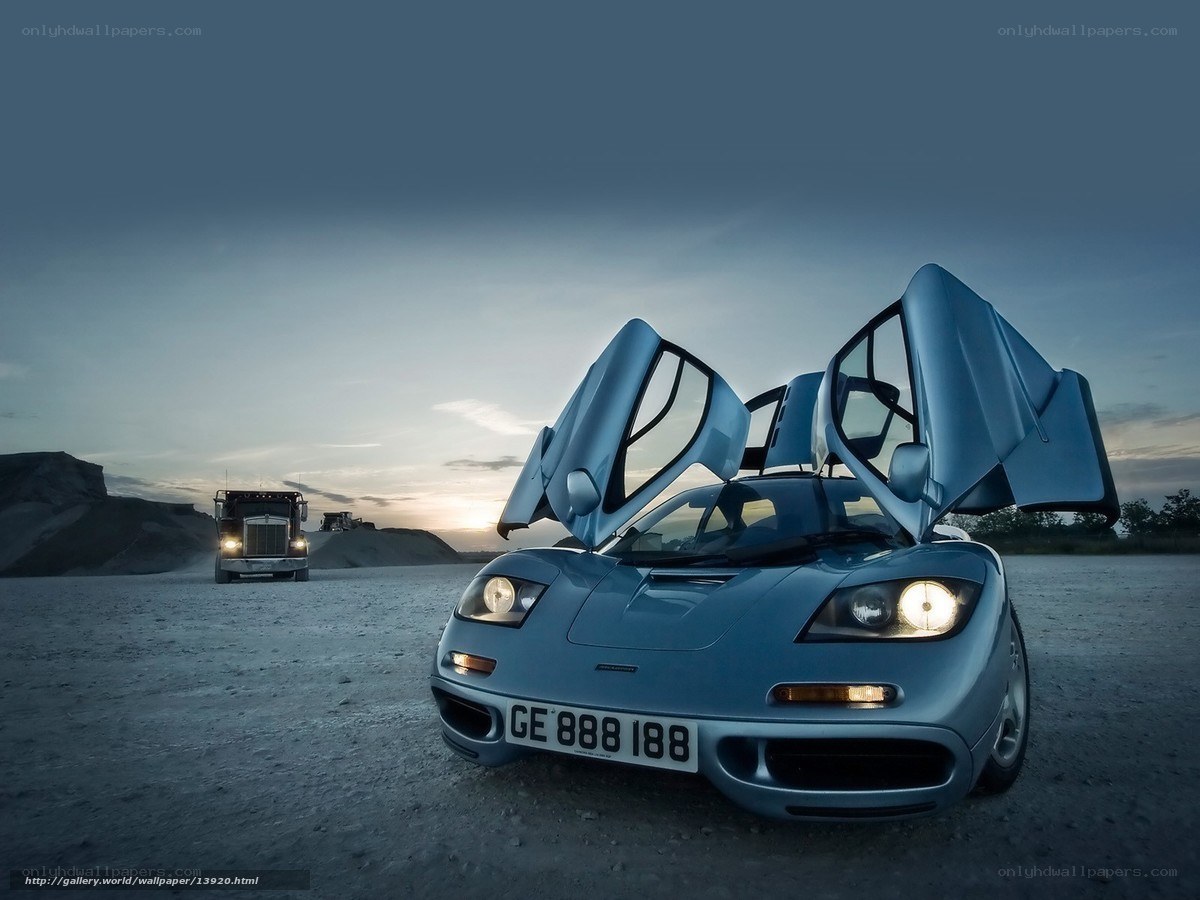 Supercar in quarry at dusk