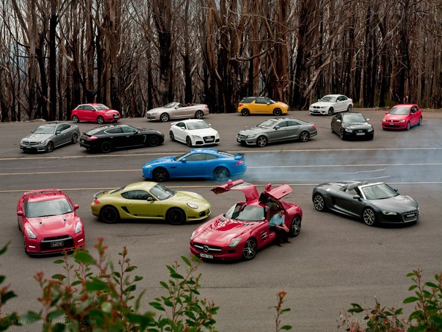Supercar lineup on a road