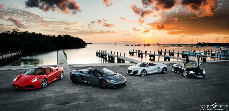 Supercars at sunset by the marina