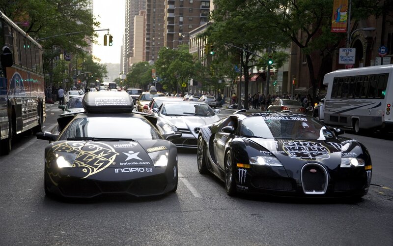 Supercars in city traffic