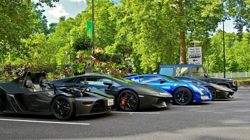 Supercars in Parking Lot — Green