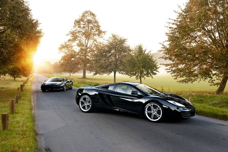 Supercars on a country road