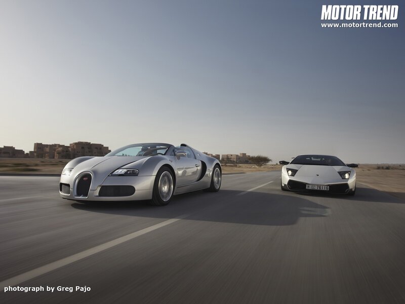 Supercars on a desert road