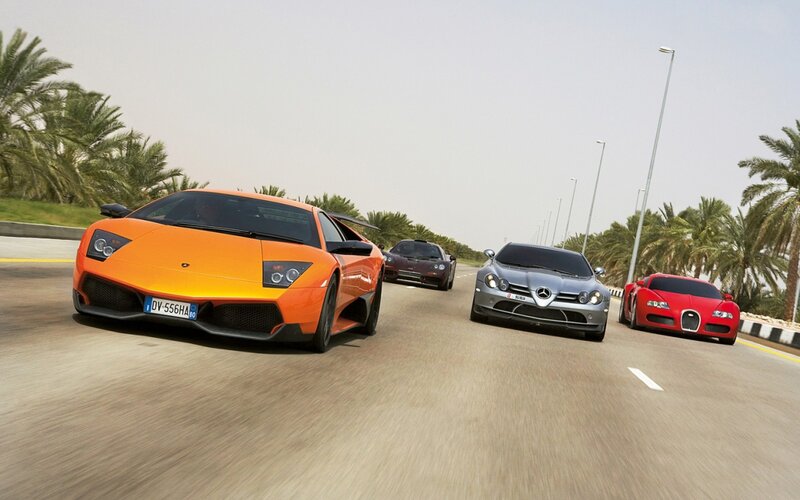 Supercars on a desert road