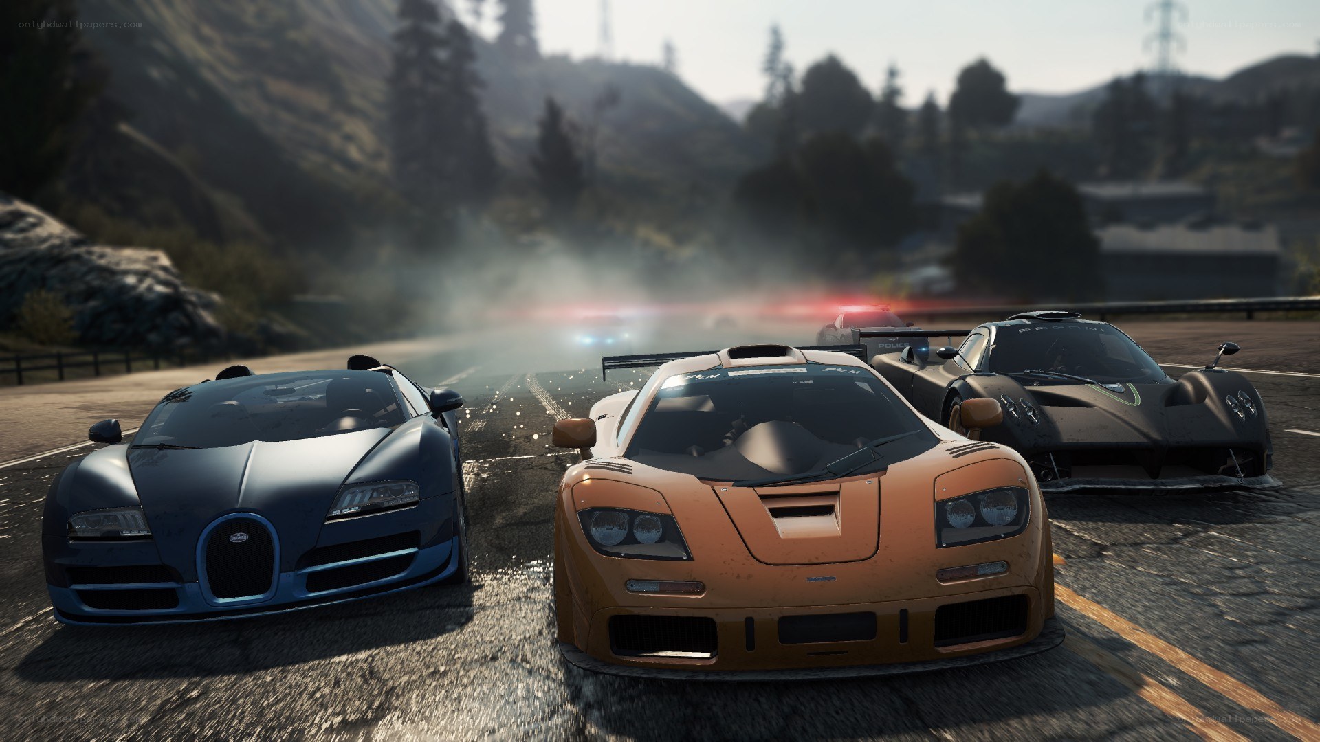Supercars on a mountain road