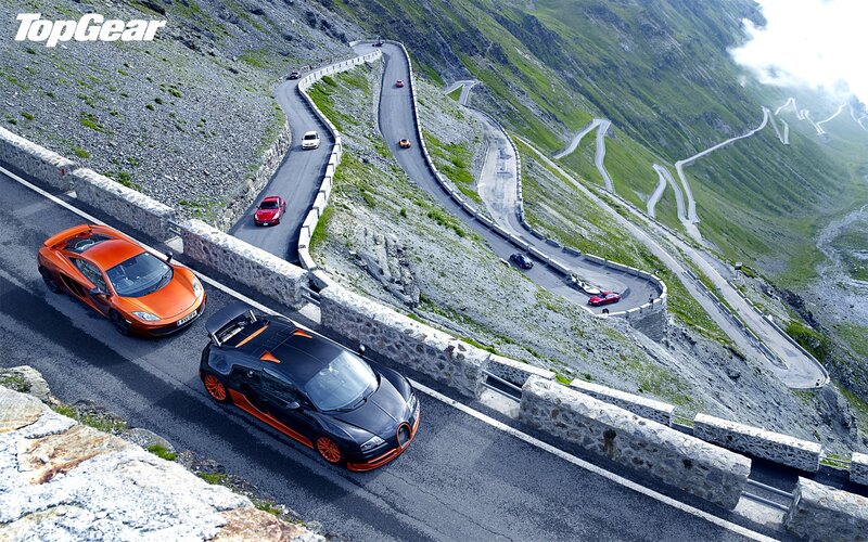 Supercars on a mountain road