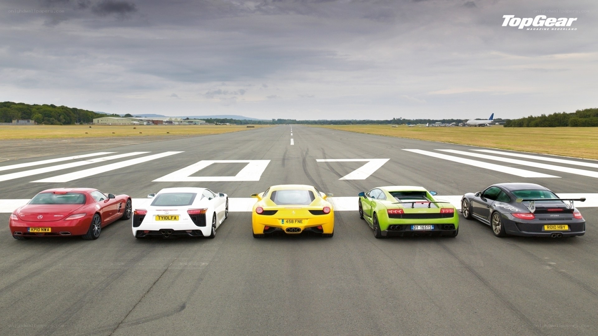 supercars on a runway