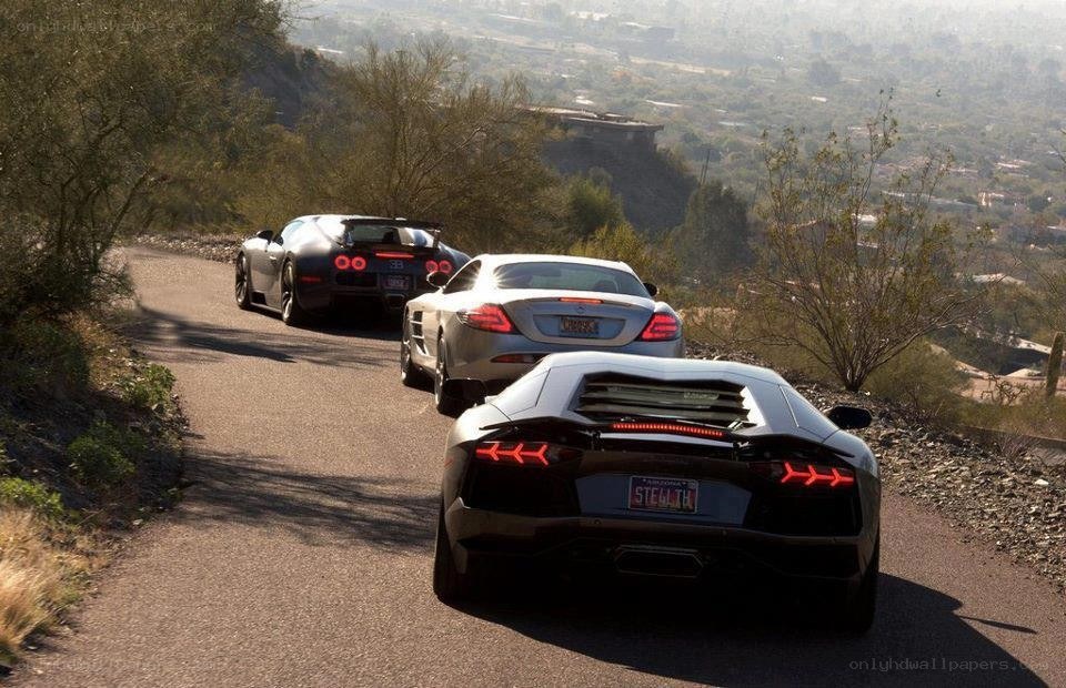 Supercars on a winding road