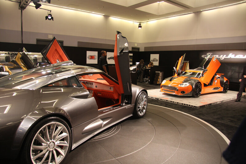 Supercars on display at an auto show