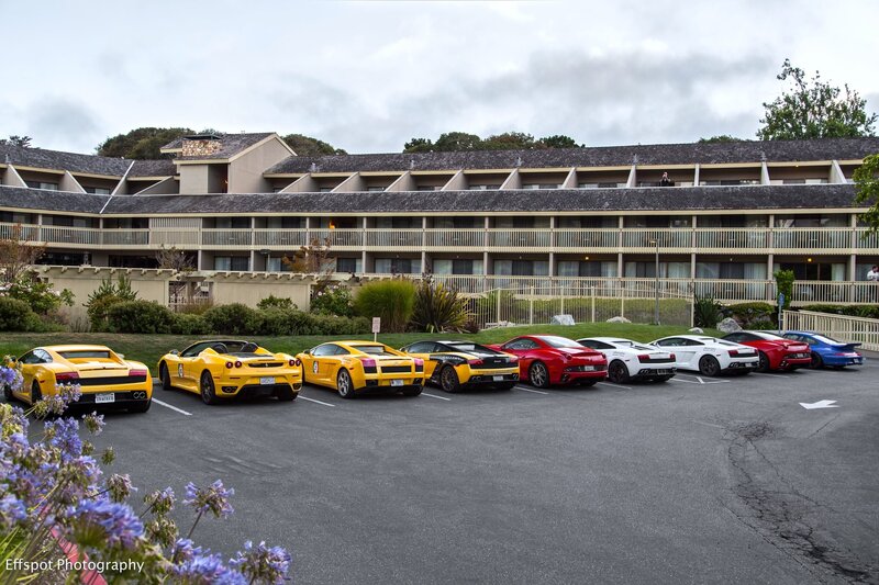 Supercars parked outside a hotel