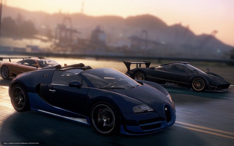 Supercars racing at sunset