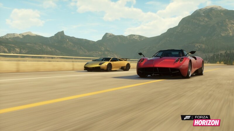 Supercars racing on a mountain road
