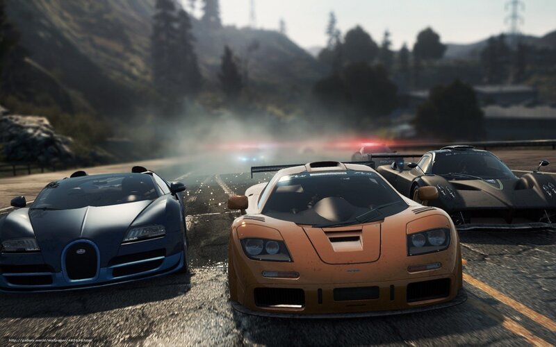 Supercars racing on a mountain road