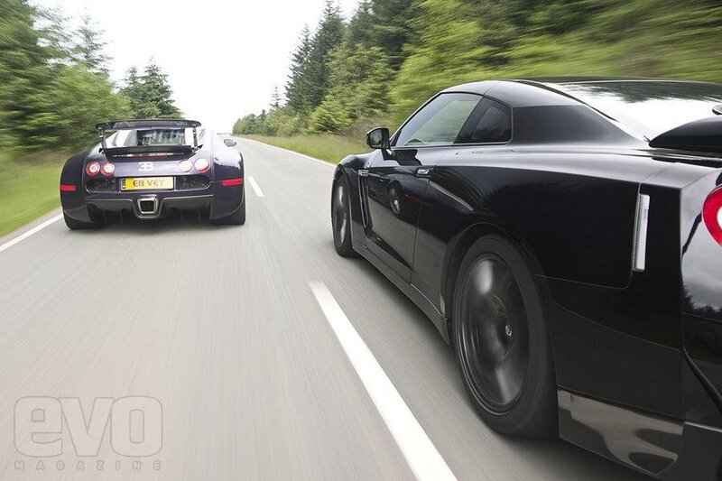 Supercars racing on a road