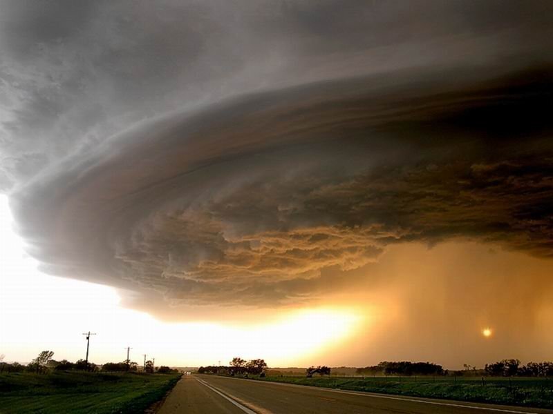 Supercell Thunderstorm — Gray, Dramatic, Sunset, Photograph, Road, Trees, Orange