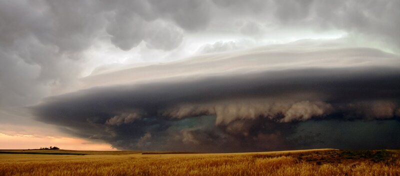 Supercell Thunderstorm — Gray, Dramatic, Sunset