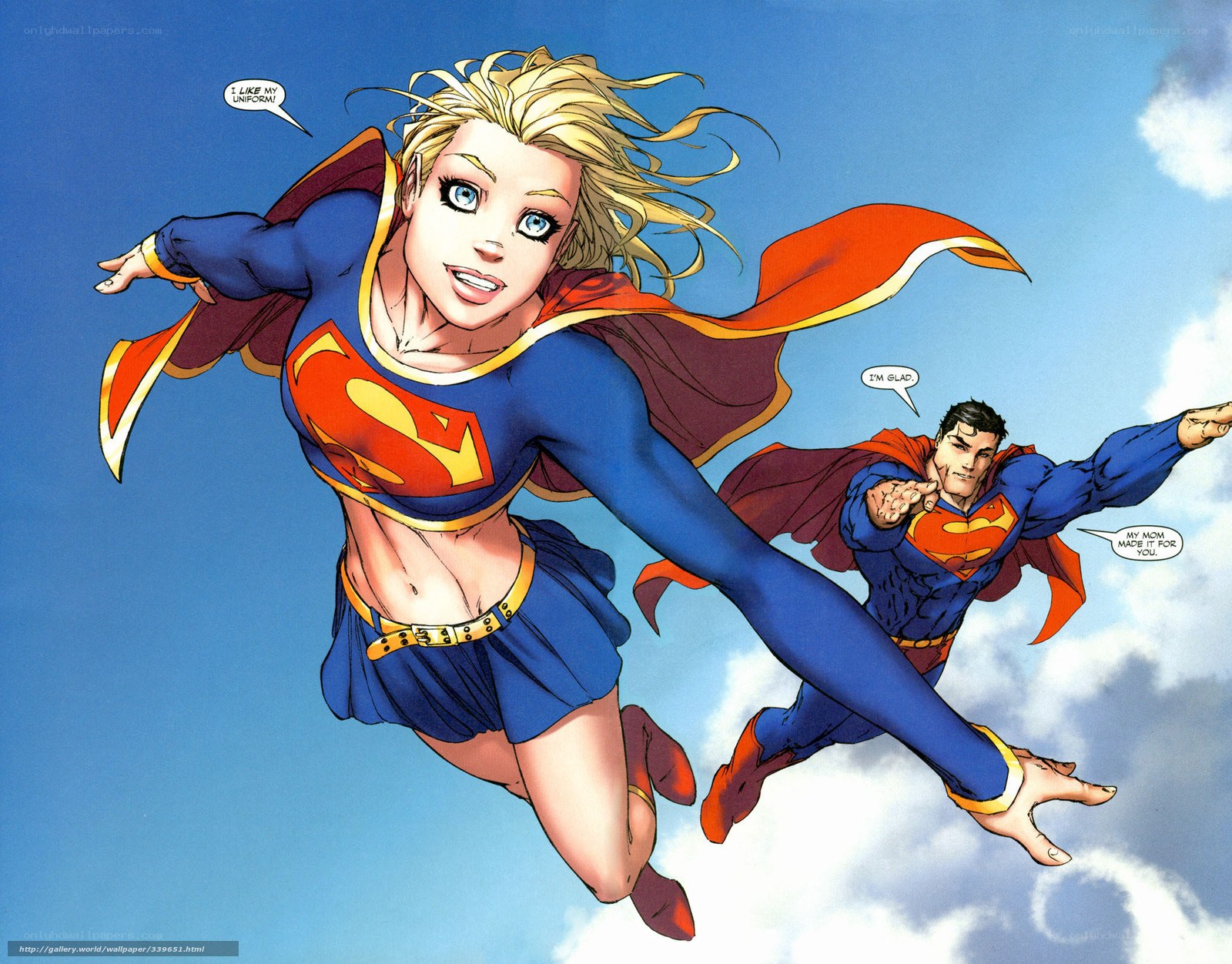 Supergirl and Superman flying