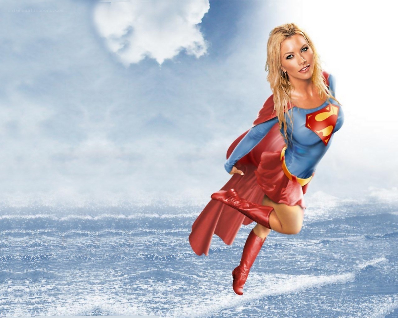 Supergirl flying over ocean