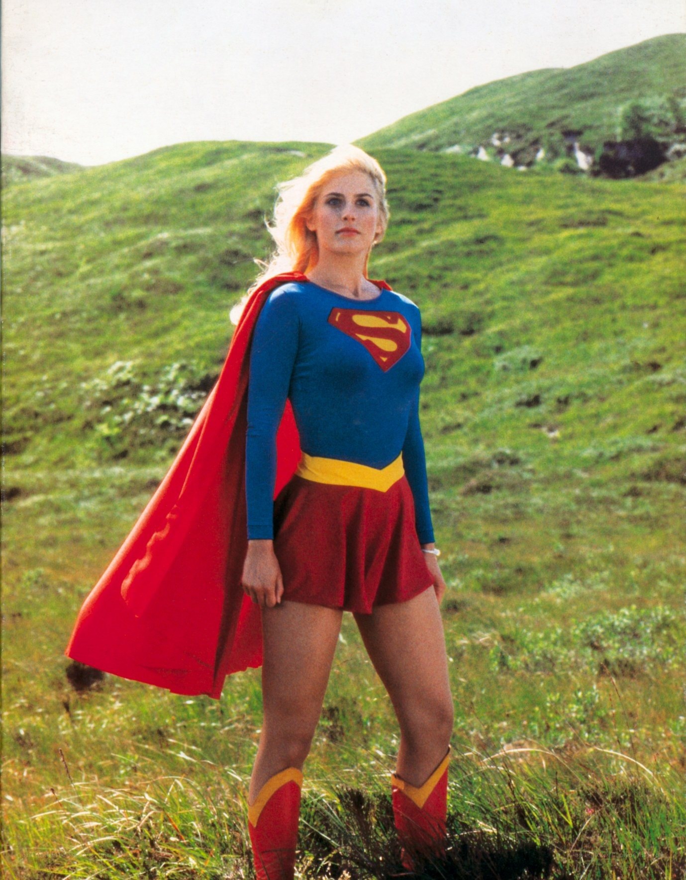 Supergirl in a field