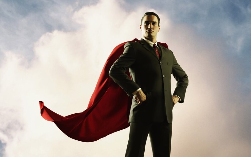 superhero businessman with red cape