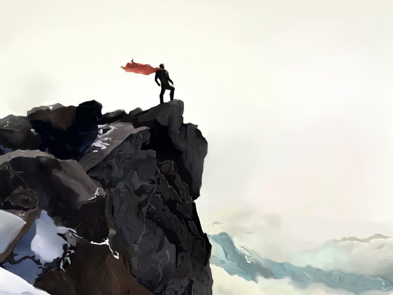superhero on mountain peak