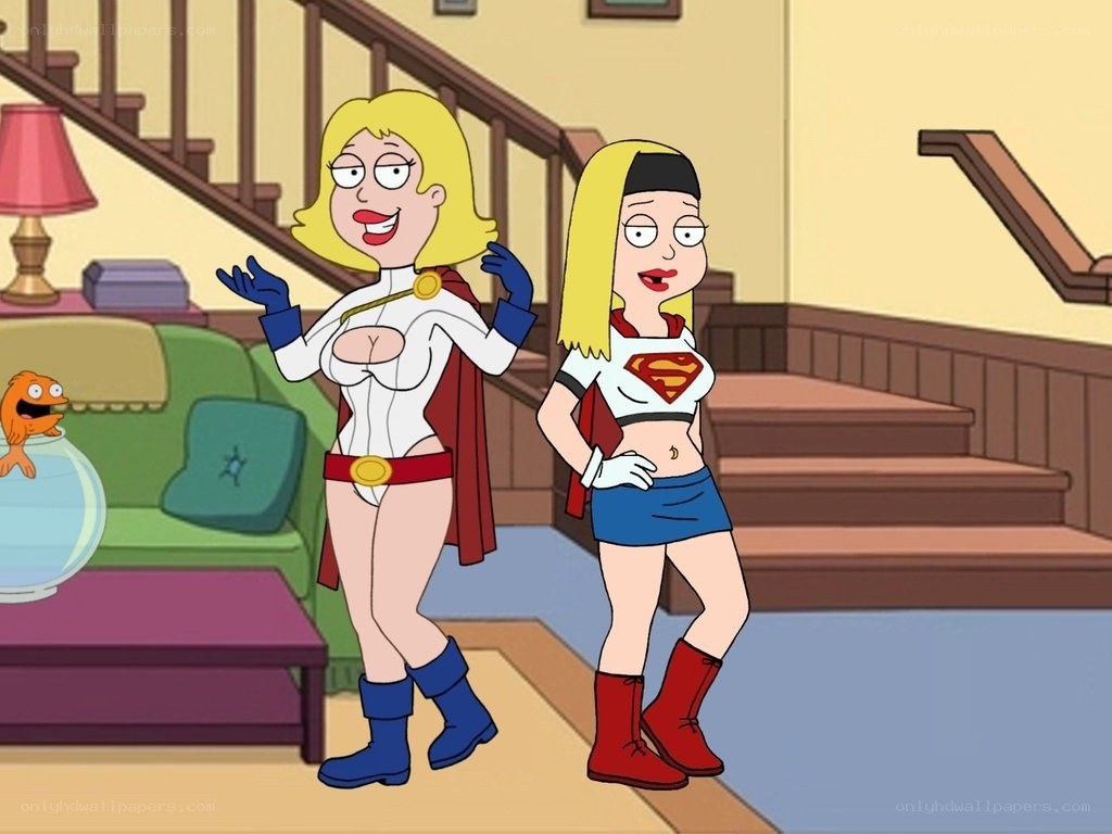 Superhero sisters in living room