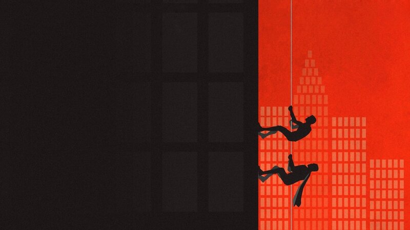 Superheroes climbing building