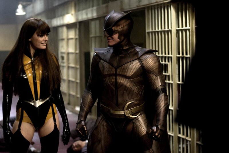 Superheroes in a prison corridor
