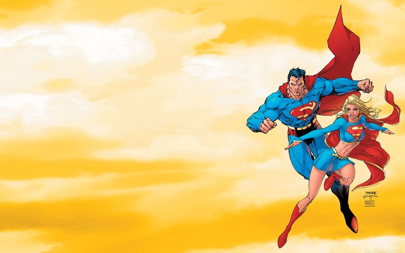 Superman and Supergirl flying