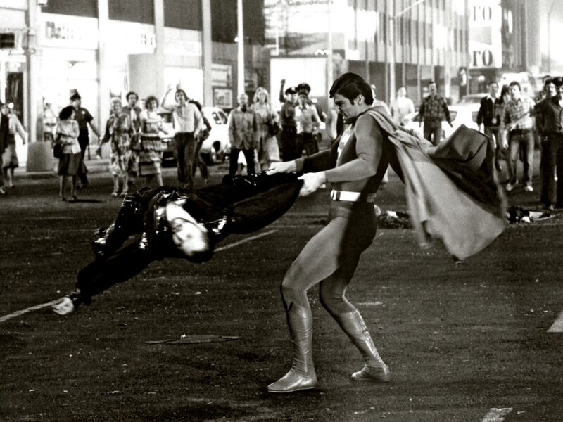 Superman Carrying a Man