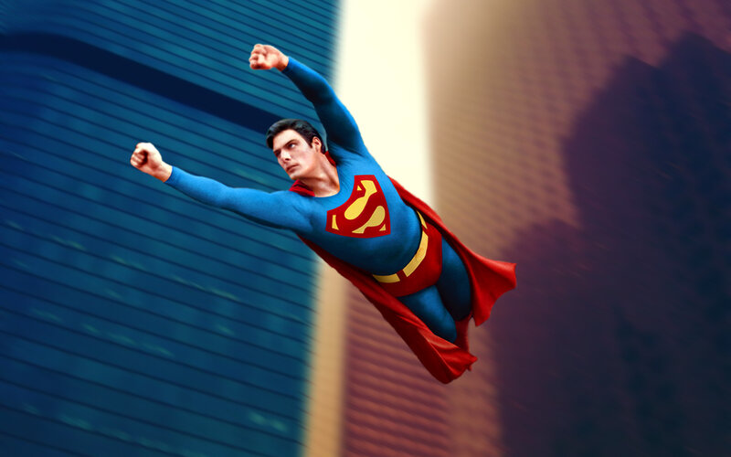 Superman flying over city